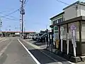 Bus stops in front of Maki Station, March 2020