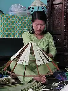 Making conical hats (nón tơi) in Huế countryside, Vietnam