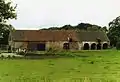 Farm with remnants of Makken Castle