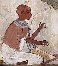 A blind harpist from a mural of the 15th century BC