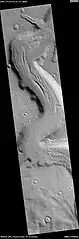 Wide view of the Mamers Valles with cliffs, as seen by HiRISE.