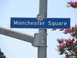 Manchester Square city sign located at Vermont Avenue and 83rd Street