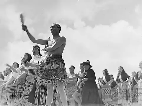 Maori cultural group performing, wearing piupiu c. 1943