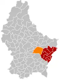 Map of Luxembourg with Junglinster highlighted in orange, and the canton in dark red