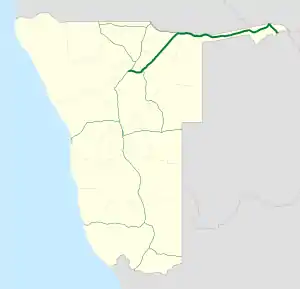 Map of Namibia with a long green line running from the north to the south of the country, with one section of the line coloured blue instead.  The green sections of the line signifies the B1.