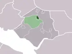 The village centre (darkgreen) and the statistical district (lightgreen) of Abbenbroek in the former municipality of Bernisse.