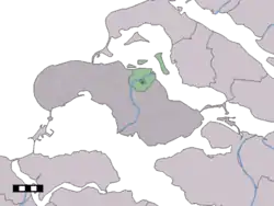 The village centre (dark green) and the statistical district (light green) of Zonnemaire in the municipality of Schouwen-Duiveland