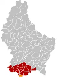 Map of Luxembourg with Rumelange highlighted in orange, and the canton in dark red