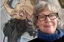 Marianne Muggeridge in front of her oil painting, Natasha (2002)