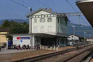 Three story building with gabled roof