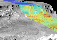 Combined infrared and daytime observation of Melas Chasma. The shadowed regions (blue) indicate successive landslides.