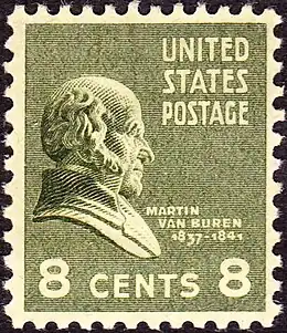 Postage stamp with the image of a bust of a balding man in profile and facing right