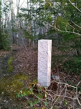 Massachusetts-Connecticut border marker on northern border of Tunxis State Forest in Hartland (near northern end of Pell Road