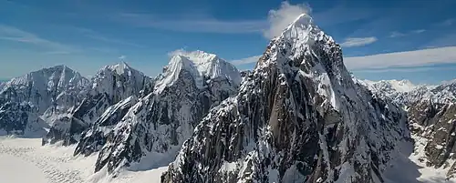 Left to right: Mount Church, Mount Johnson, Mount Wake, and Mount Bradley seen from a flight through Ruth Gorge