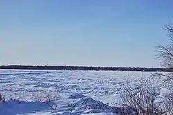 A view of Matheson Island and the ice road to the community in winter.