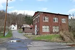 Former bank and surrounding buildings in Meadow Creek in 2022