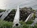 Meat storage pit, Naukan. Whale ribs cover the pit.