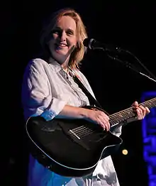 Melissa Etheridge with her Adamas signature model