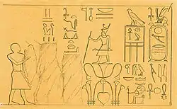 Drawing in black ink on yellow paper showing a standing pharaoh, staff in hand, surrounded by hieroglyphs