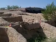 A view of test pits from Station 6 of the north end of the mound.