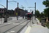 A tram from Pinar de Chamartín arrives at Las Tablas (ML-1).