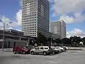 The headquarters of Miami-Dade Transit, known as the Overtown Transit Village, is adjacent to the Historic Overtown-Lyric Theater Metrorail station, yet still has a large parking garage.