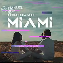 A picture of two men and women seated, holding hands in a desert. The song's title and artists are superimposed on them alongside violet horizontal stripes.