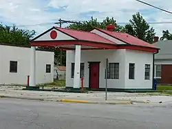 Former Miami Marathon Oil Company service station. Building was last used as a salon.