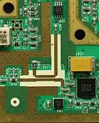 Microstrip directional coupler on the output of a local oscillator on a spectrum analyser PCB.