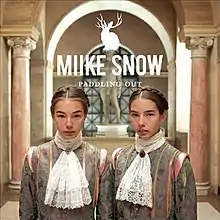 Two female children dressed in Victorian fashion pose in front of a statue in a marble hallway. A jackalope logo and the words 'Miike Snow' and 'Paddling Out' appear above their heads.