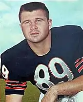 Mike Ditka in the press booth of a pre-season football game