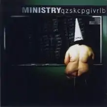 a naked obese woman in a dunce cap seated in front of a blackboard where the words "I will be god" are written numerous times.