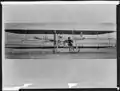 Law at Daytona Beach with her first plane, a Wright Model B