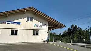 Two-story building with gabled roof