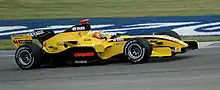 Tiago Monteiro driving at Indianapolis during the 2005 United States Grand Prix.