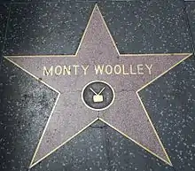 Monty Woolley's star, showing a "TV" emblem, even though his category is "Motion Pictures"