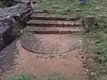 Moonstone and steps at Pavurallakonda Buddhist Ruins