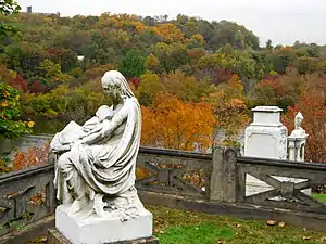 The Mother and Twins Monument was carved by Polish sculptor Henry Dmochowski-Saunders.  It depicts his deceased wife Helena Schaff and their two deceased children