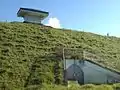 Showing the water reservoir installations at the top of the mountain.