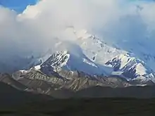 The top of Denali is shrouded in clouds