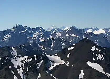 Image 25The Coast Mountains are heavily eroded by glaciers, including Mount Waddington (far background, center). (from Geology of the Pacific Northwest)