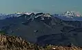 Northwest aspect of Mount Watson centered.Glacier Peak distant right. Snowking distant left.