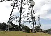 Close-up view of the Mount Nardi transmission towers; from the front: the ABRN6 digital TV tower; the central tower (Telstra-2); the NRN8 (originally: RTN-8) original analogue TV tower