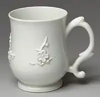 Mug with sprigged Chinese-style plum-blossom decoration, an example of Bow's cheaper wares.