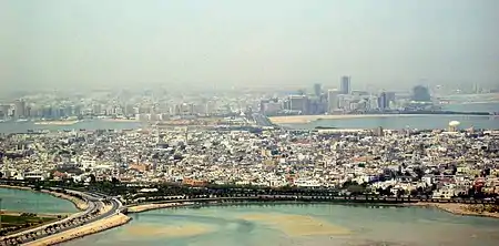 Image 45The cities of Muharraq (foreground) and Manama (background) (from Bahrain)