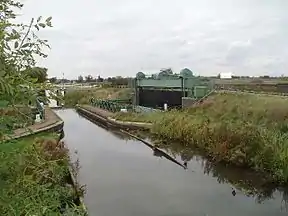 The route along Well Creek crosses the  Mullicourt Aqueduct above the Middle Level Main Drain.