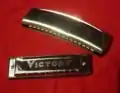 Harmonica (rear) and Blues harp (front)