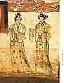 Women possibly wearing shanqun (upper garment over skirt) and beizi (Song-style clothing), inner chamber of the Tomb of Zhang Kuangzheng, Liao dynasty. The hairstyle is Khitan-style.