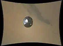 Ejected heat shield as viewed by Curiosity descending to Martian surface (6 August 2012)