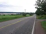 Route 114 passes through Lower Coverdale on the eastern edge of the town of Riverview. The road parallels the south and east bank of the Petitcodiac River from Riverview to Riverside-Albert.